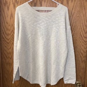 Cream sweater with lace up back